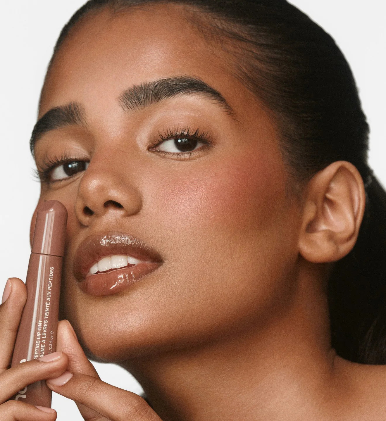 rhode peptide lip tint macadamia butter -  caramel brown